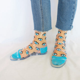 COUCOU SUZETTE Chaussettes Transparentes - Oeil Bleu, parfaite idée de cadeau pour femme.